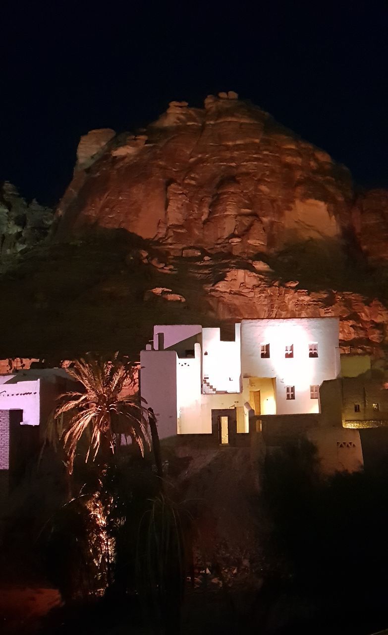 ILLUMINATED BUILDING AT NIGHT