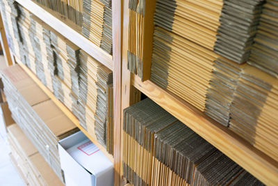 High angle view of books in shelf