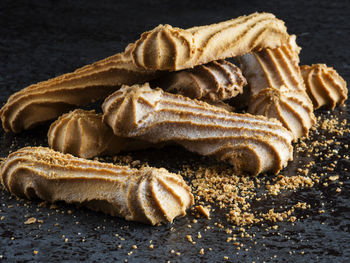 Close-up view of bread on black background