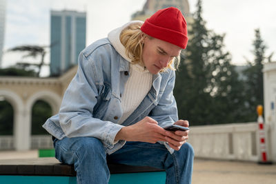 Young woman using mobile phone