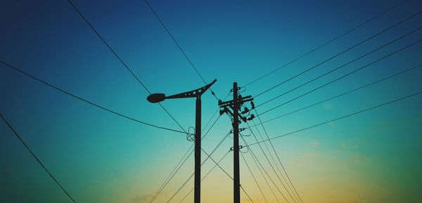 Low angle view of electricity pylon