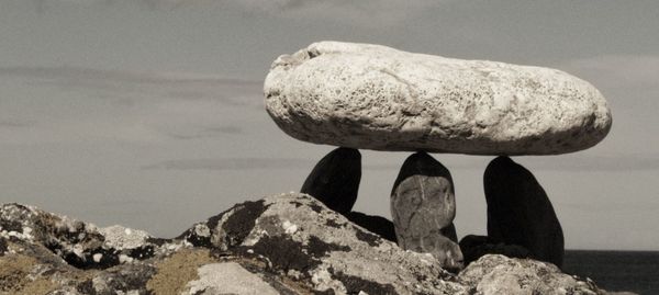 Woman standing on rocks