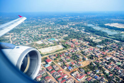 Aerial view of cityscape from an airplane window