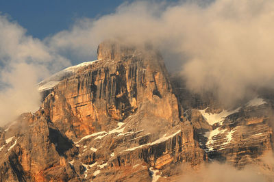 Low angle view of majestic mountain against sky