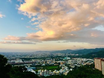 High angle view of townscape against sky during sunset