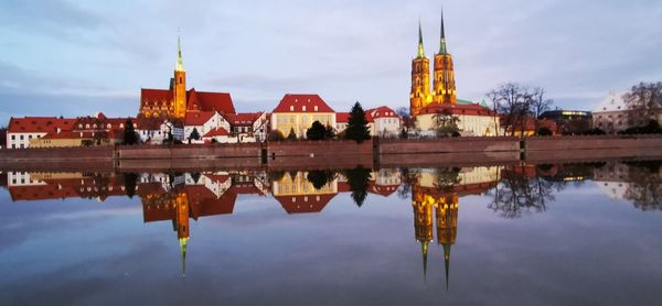 Reflection of buildings in lake