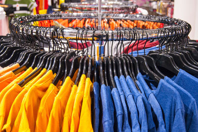 Multi colored flags hanging at store