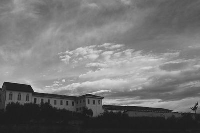 Built structure against cloudy sky