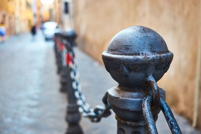 Close-up of bicycle on railing