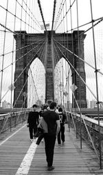 People walking on brooklyn bridge