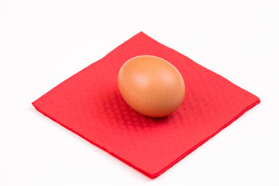 Close-up of cake on white background