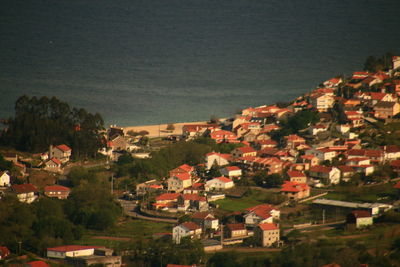 High angle view of houses against sky at night