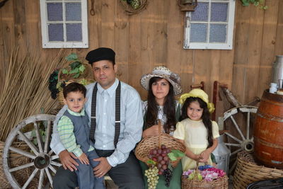 Portrait of family sitting at home