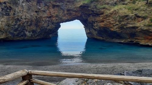 Scenic view of rock formation in sea