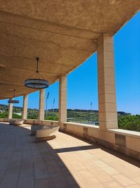 Low angle view of barcelona's olympics site against clear blue sky