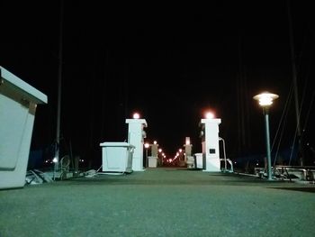 Illuminated street lights at night