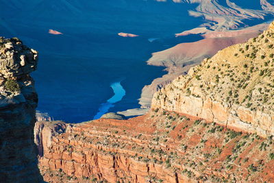 High angle view of lake amidst mountains