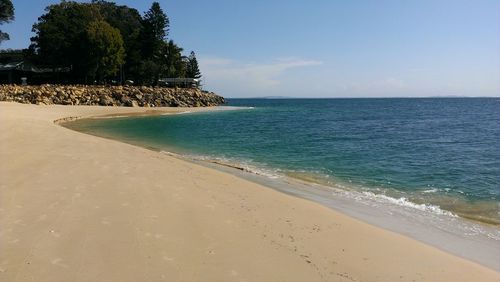 Scenic view of beach against sky