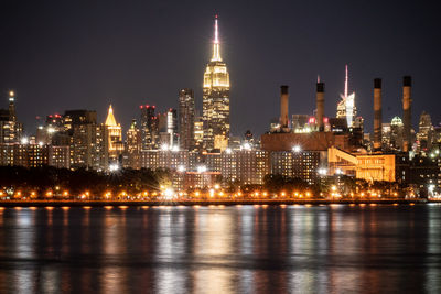 Illuminated buildings in city at night