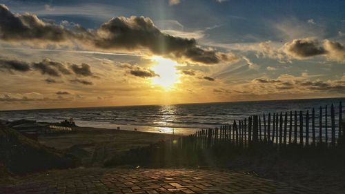 Scenic view of sea at sunset