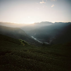 Scenic view of landscape against sky during sunset