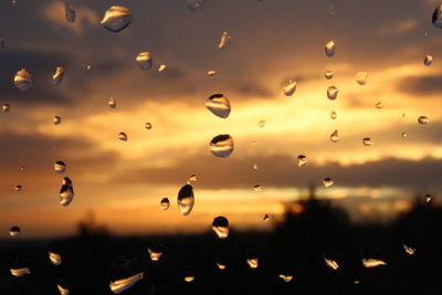 Full frame shot of water drops against sky