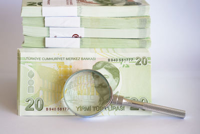 Close-up of information sign on table