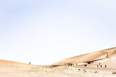 Scenic view of desert against clear sky