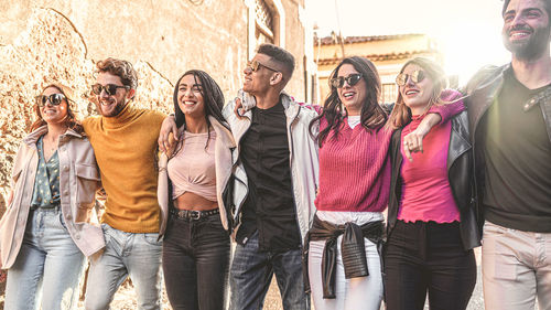 Group of people against wall in city