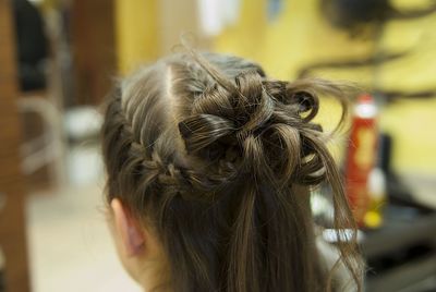 Close-up of woman hairstyle at salon