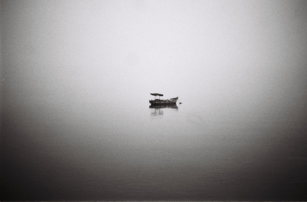 BOAT SAILING ON SEA