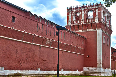 Low angle view of old building against sky