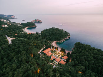 High angle view of swimming pool by sea against sky