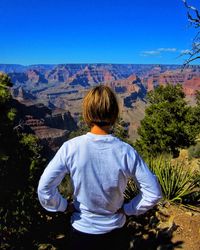 Rear view of woman looking at grand canyon national park