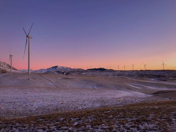 Scenic view of field against sky during sunset