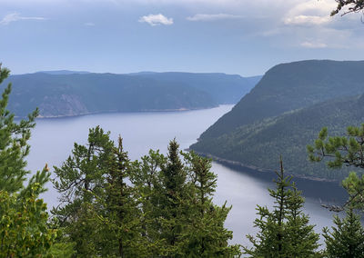 The saguenay fjord is shown on a summer day 