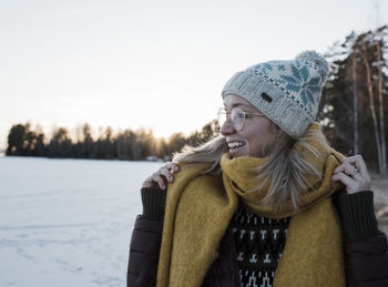 Portrait of a woman wrapped up warm whilst walking in sweden
