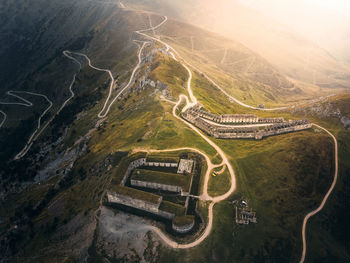 High angle view of winding road on land