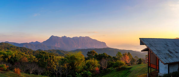 Scenic view of mountains against sky during sunset