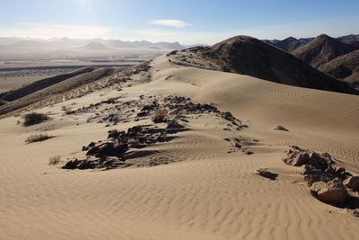 Scenic view of desert against sky