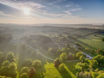 Scenic view of landscape against sky during sunset