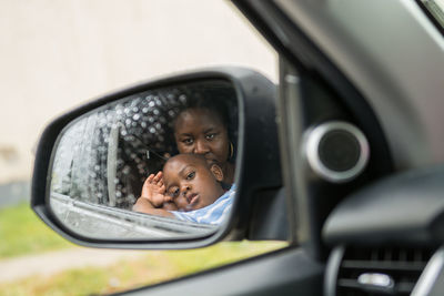 Portrait of boy in car