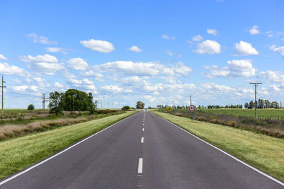 Empty road against sky
