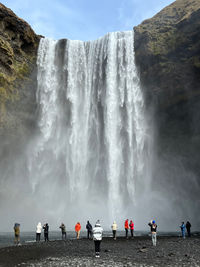 People on waterfall