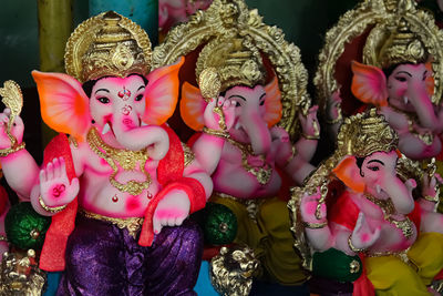 Close-up of toys for sale at market stall