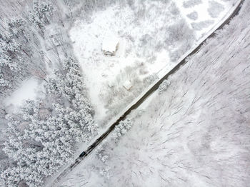 High angle view of snow covered field