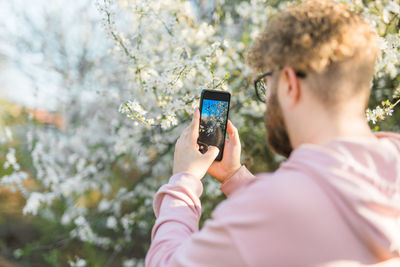 Young woman using mobile phone