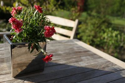 Close-up of red flower pot on table