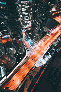 High angle view of illuminated cityscape at night