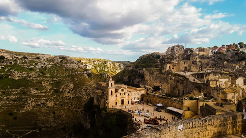 Aerial view of old town against sky